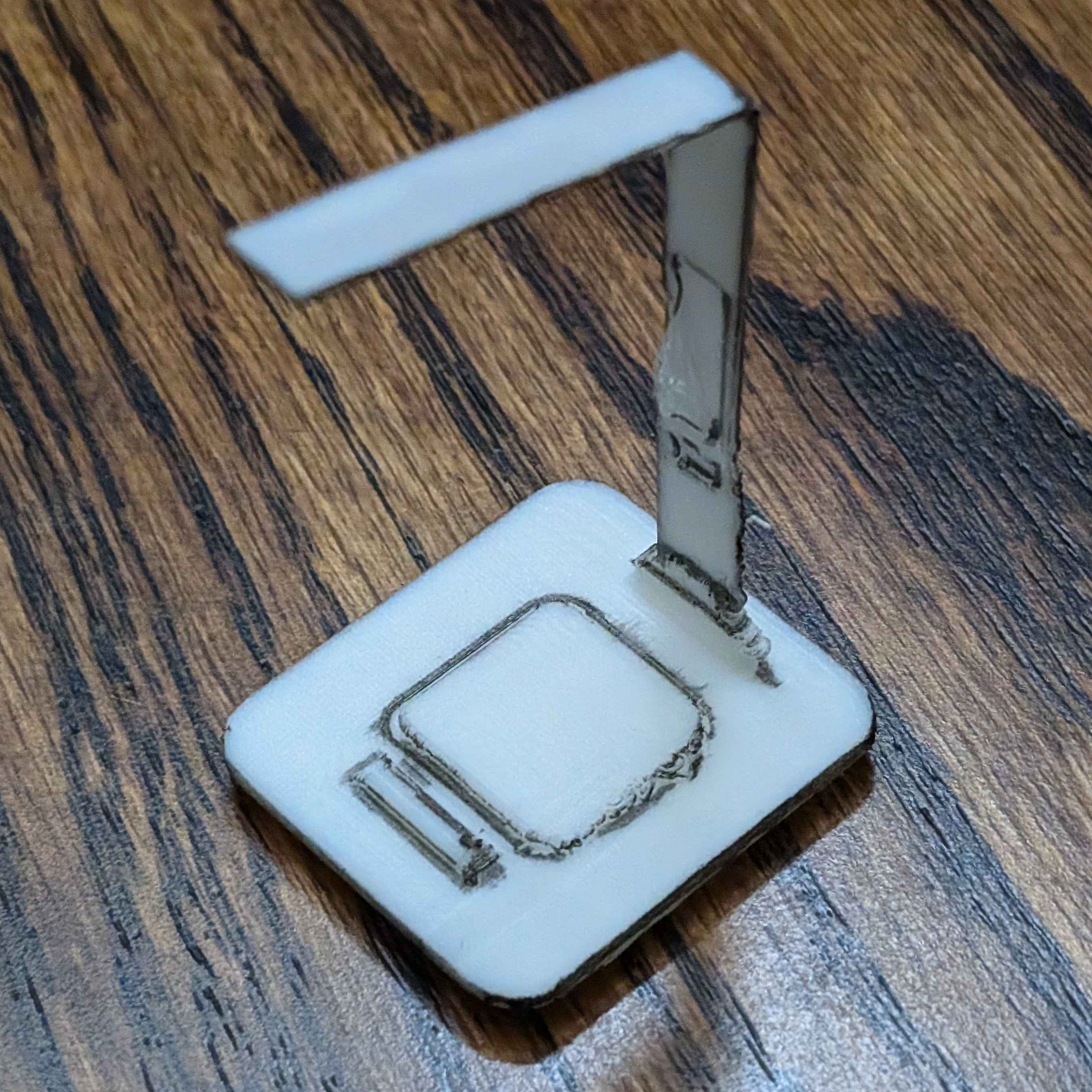 The 3D printed version of my digital desk lamp in a 3/4 angle.