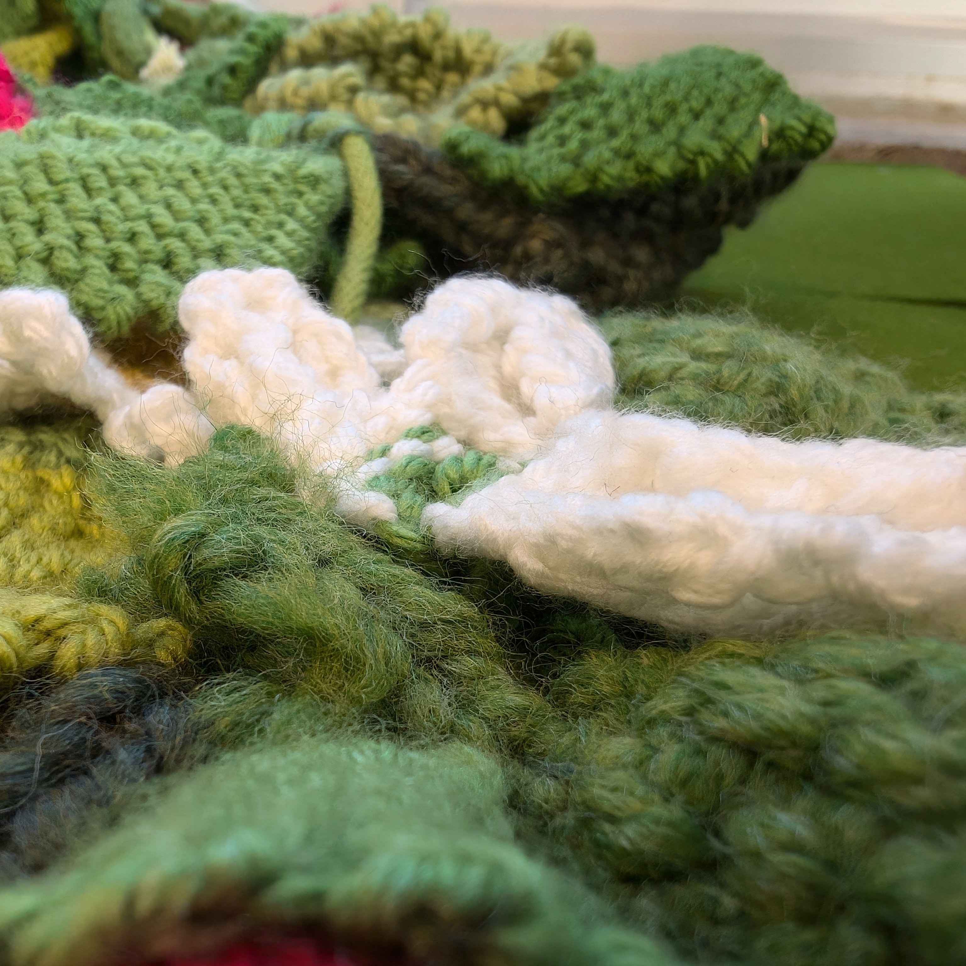 Material: String<br><br>
     This is a close-up of leftover string found in the textiles lab. The string is typically
     made with natural fabrics, dyed fabrics, or recycled fabrics. In this picture, the students
     I spoke with said these were made with natural fabrics.
     String is made from fine and delicate fabrics, such as cotton or fibre, which is woven together 
     to bundle up into a sturdier cord. These bundles of string can then be used to create fabric. 
     Some fabrics are difficult to sew, like silk or wool. They are classified as heavyweights or
     'slippery material' and can be tricky to handle due to how tough the overall strings are.