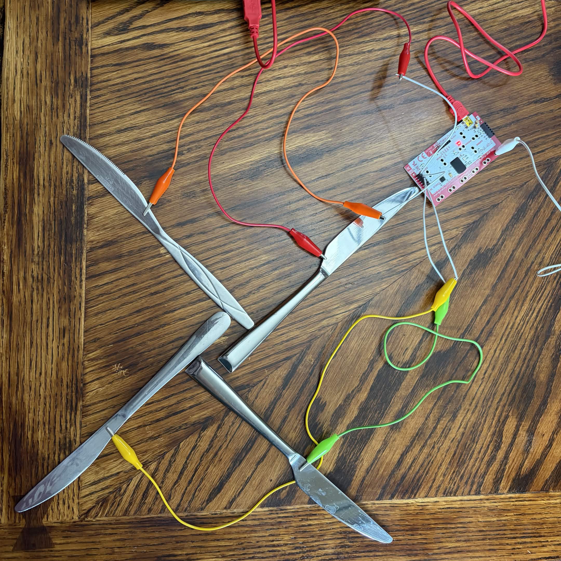 Makey Makey setup with table knives.