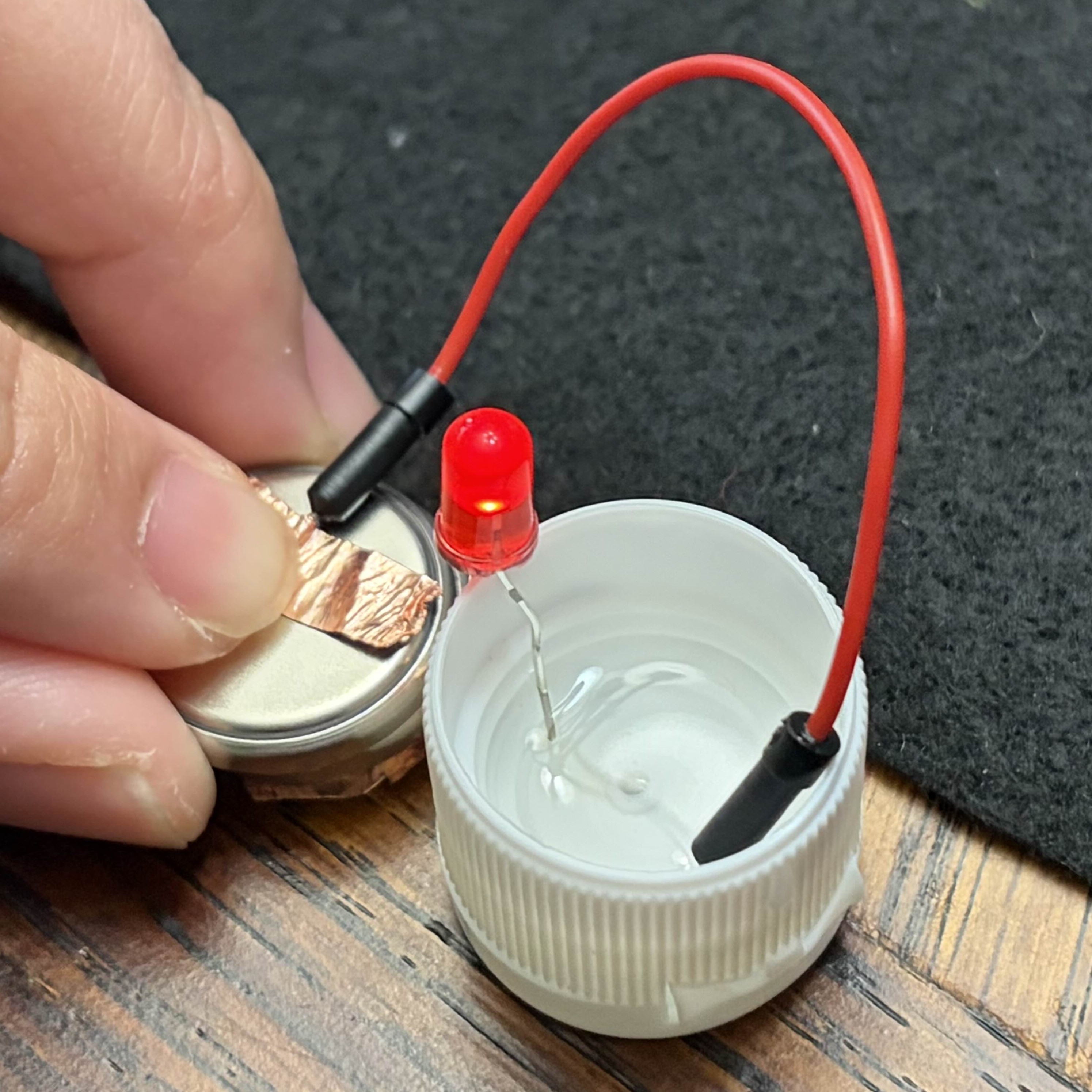 Testing to see how conductive water is with the materials in the kit. 
                Used this information if I wanted to try making a wearable that can be used underwater.