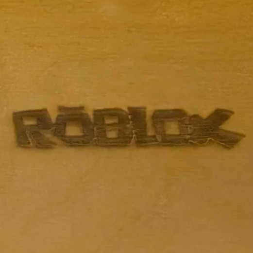 The finished laser cut of my Roblox typography I made in Adobe Illustrator.