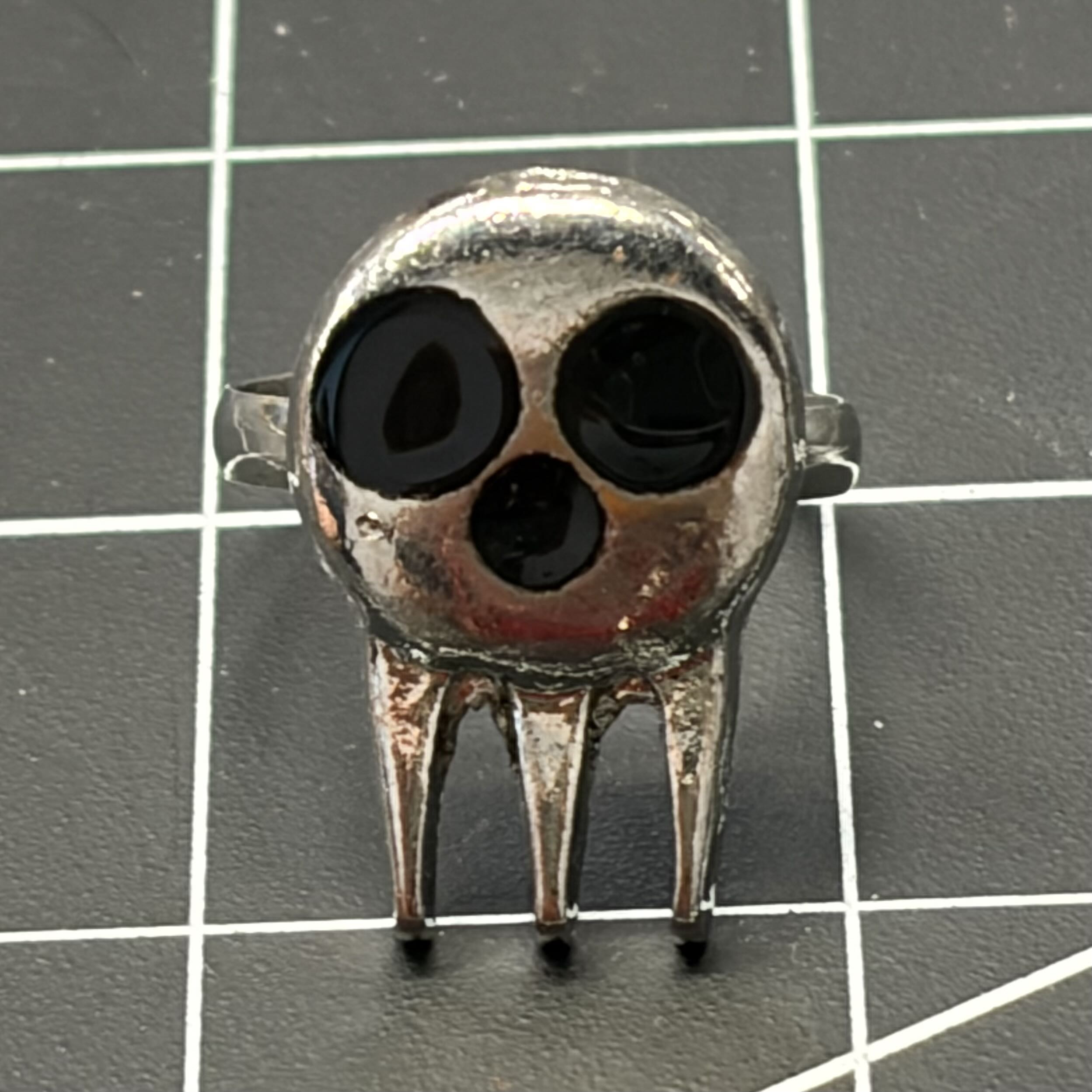 My skull ring to represent my fondness for the gothic or edgy aesthetics.